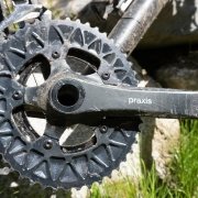 Absolute Black chain rings on Praxis cranks