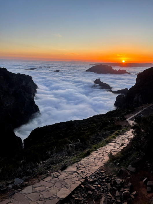 Alex above the clouds on Madeira trails